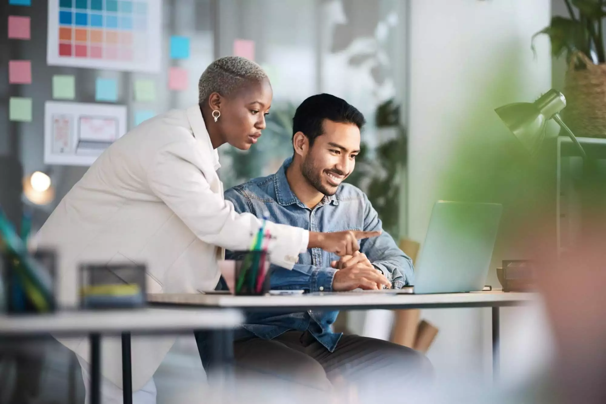 Office laptop, diversity teamwork and happy people review media application layout, creative design or research project. Collaboration, designer or professional team working on app development report.