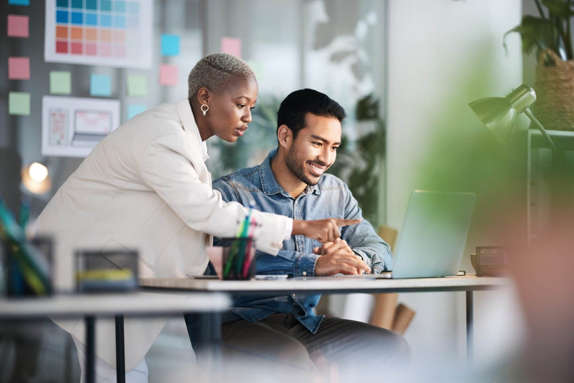 Office laptop, diversity teamwork and happy people review media application layout, creative design or research project. Collaboration, designer or professional team working on app development report.