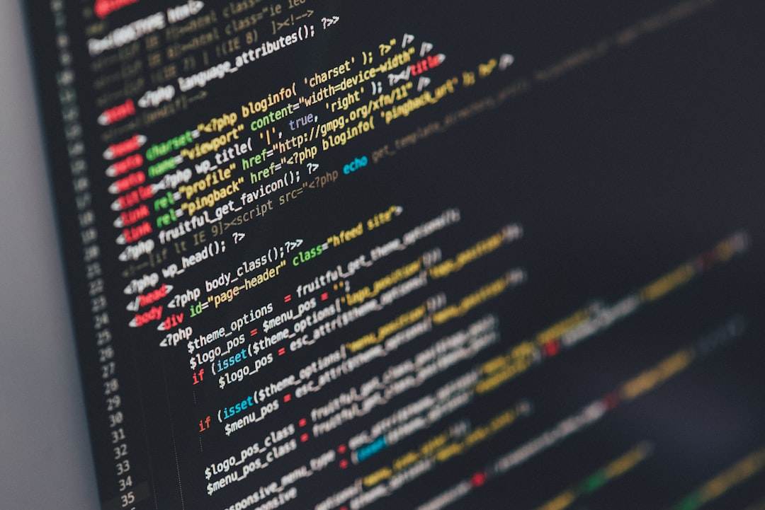 7 Essential Website Security Tips for Small Businesses A computer screen displaying lines of colorful PHP and HTML code on a black background, ideal for showcasing affordable web design services or the work of a skilled WordPress web designer.